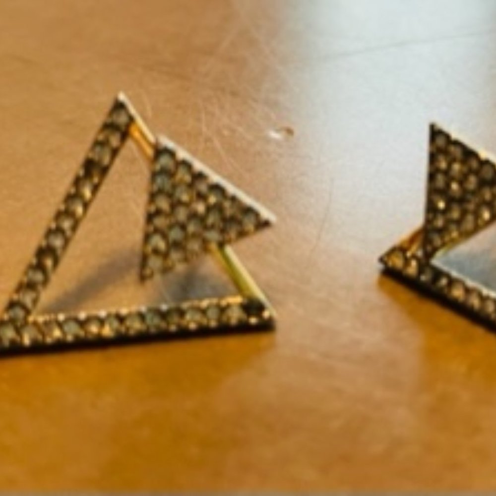 Goldtone and pave triangle shaped convertible earrings.